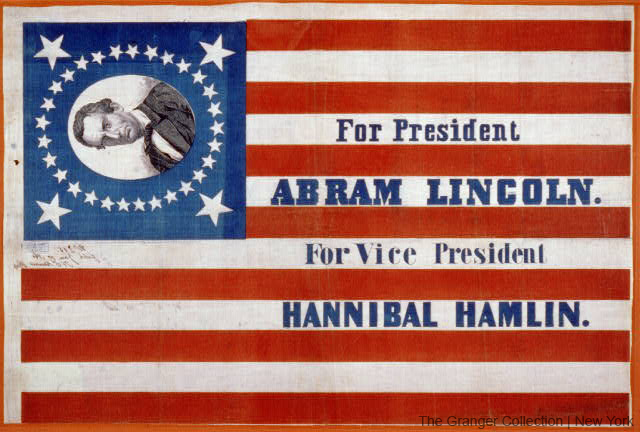 A photo shows an old presidential campaign ad showing an American flag with Abraham Lincoln's picture in the blue field where the stars are